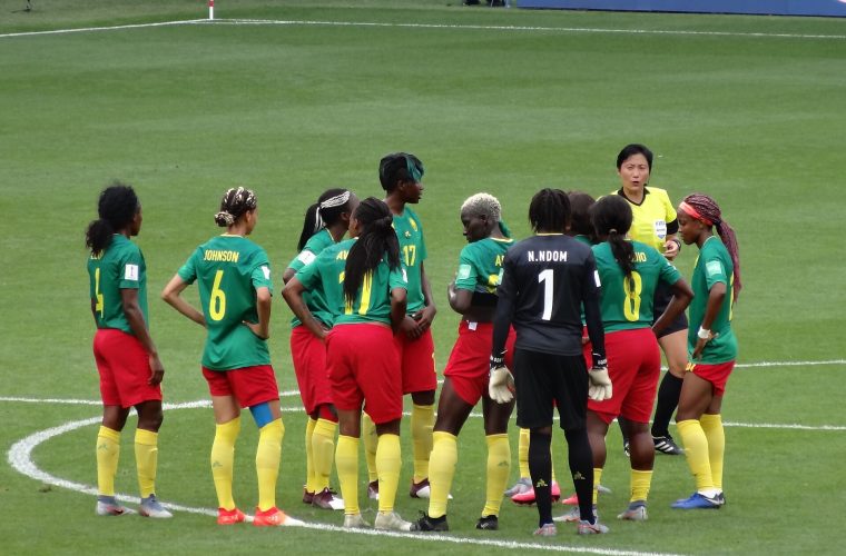 Cameroon women’s footballers gathered on the pitch