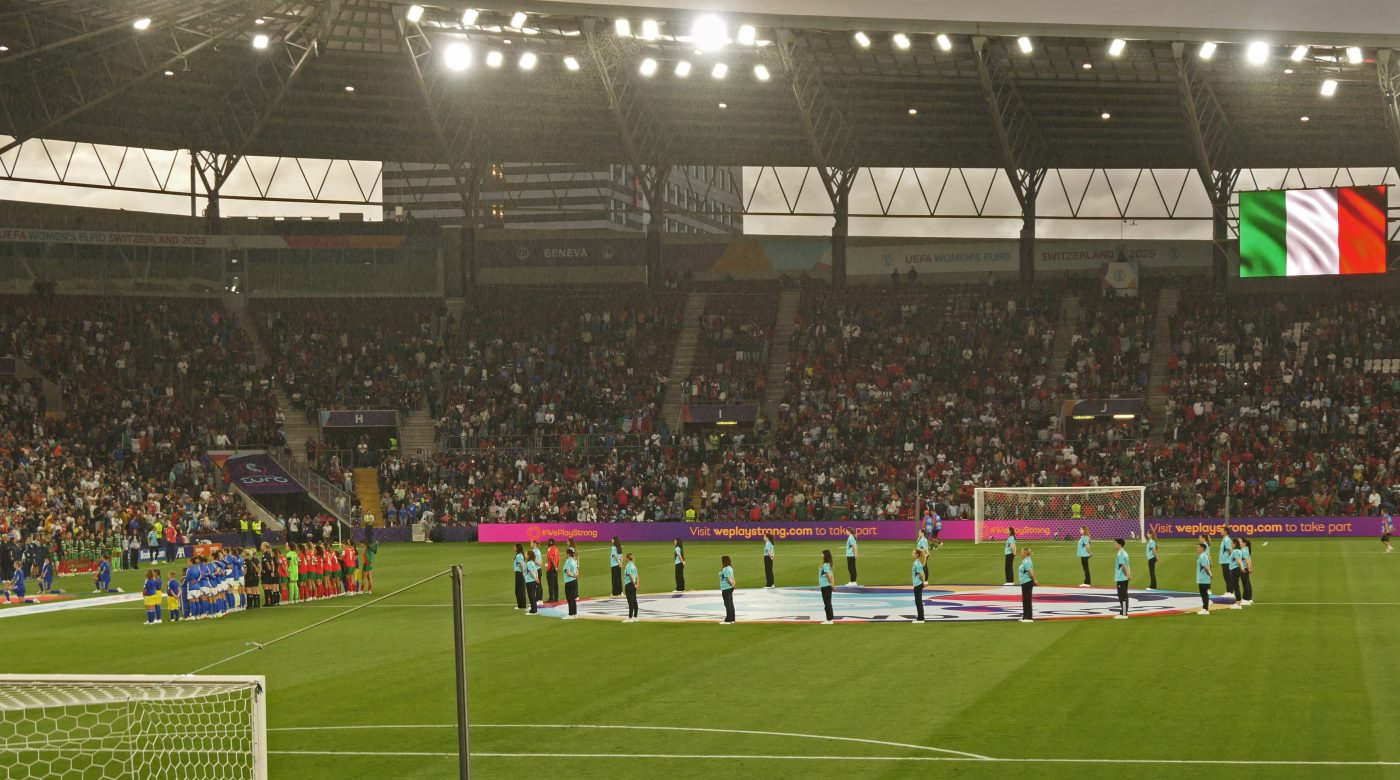 Italy and Portugal women's teams playing at the Stade de Genève in July 2025